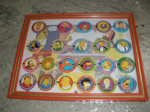 Lot simpsons pogs framed - 22,